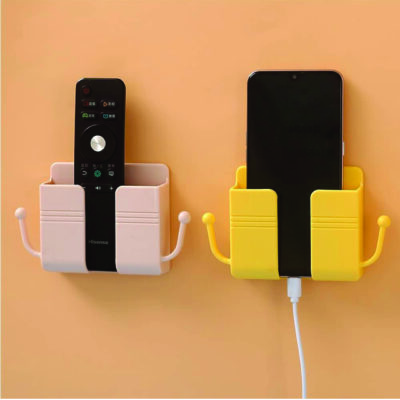 Wall mounted phone/remote holder